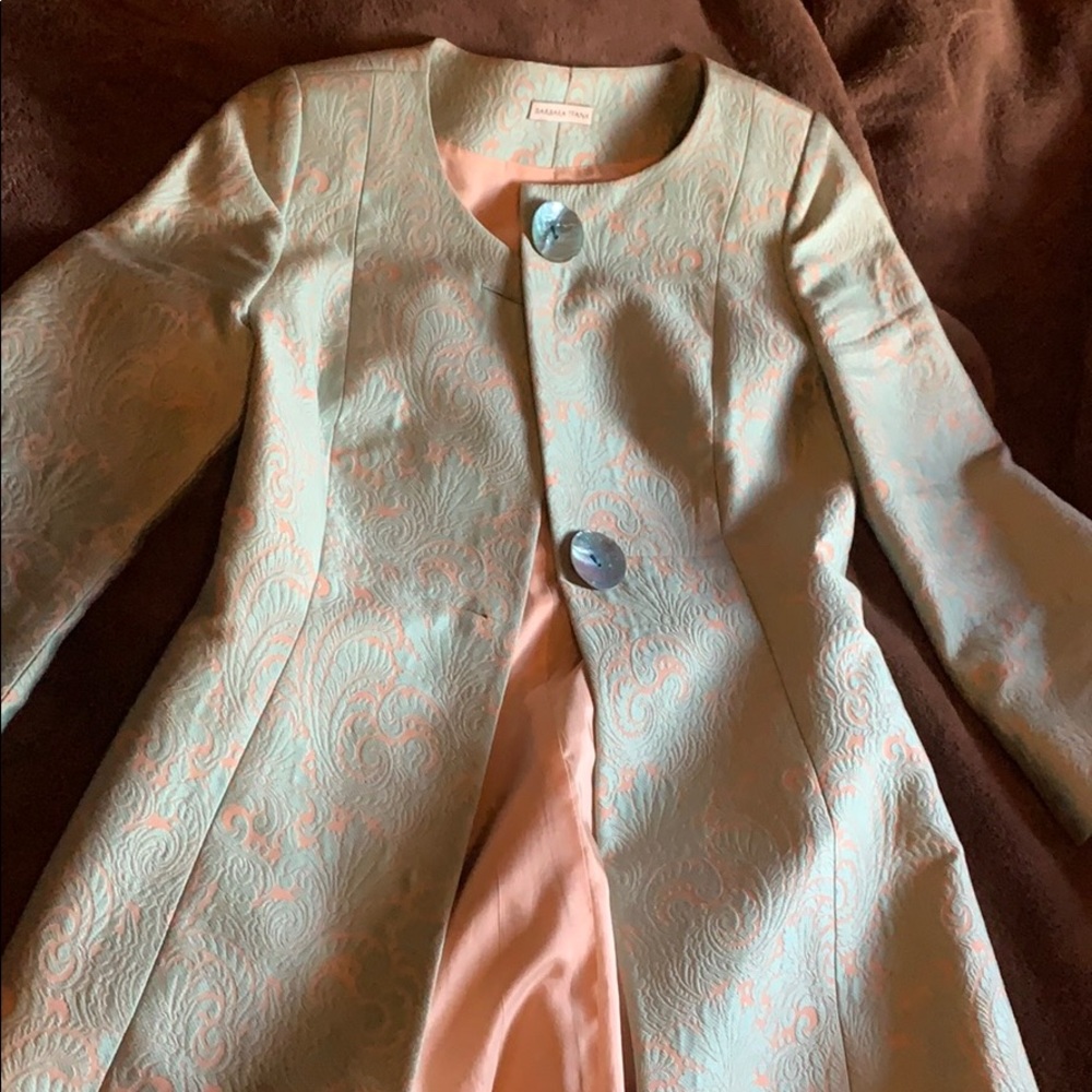 Light aqua/peach color coat